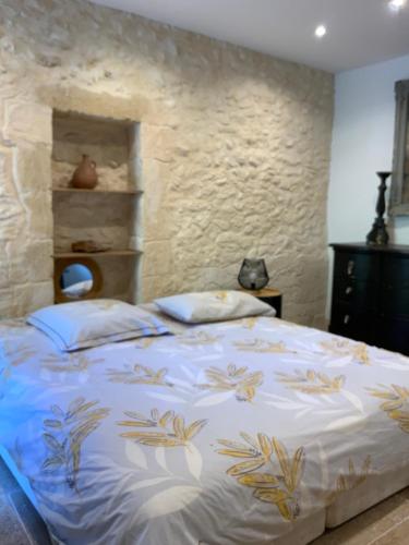 Ένα ή περισσότερα κρεβάτια σε δωμάτιο στο Maisonnette de charme 60m2