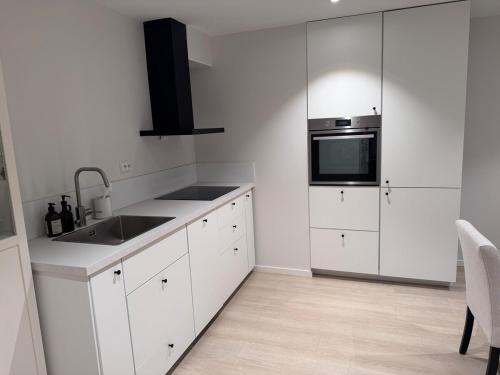 Dapur atau dapur kecil di Modern rental unit in Kristiansand