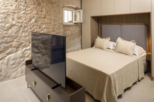 Ένα ή περισσότερα κρεβάτια σε δωμάτιο στο Villa Maja Aurelia in the centre-Romantic studio