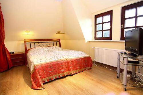 Ένα ή περισσότερα κρεβάτια σε δωμάτιο στο Ferienhaus Humptrup