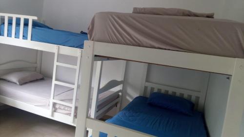 a couple of bunk beds in a room at CostaSame Casablanca in Same