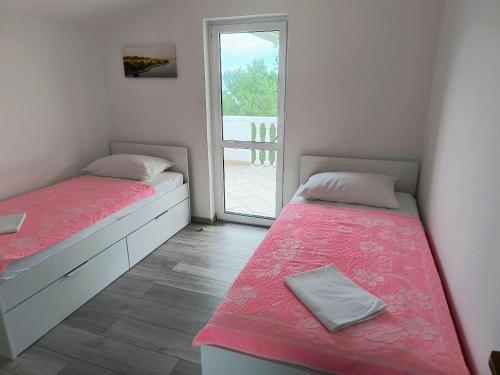 Ένα ή περισσότερα κρεβάτια σε δωμάτιο στο Apartment Glory