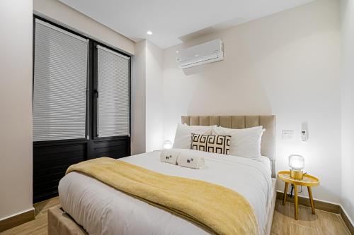 Postel nebo postele na pokoji v ubytování La Cuadra By Wynwood House