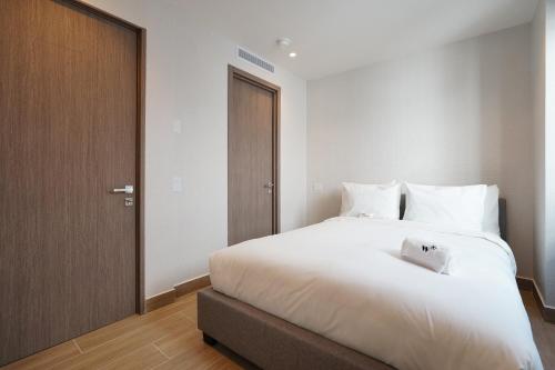 Postel nebo postele na pokoji v ubytování La Cuadra By Wynwood House