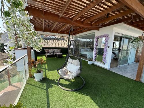 Zahrada ubytování Suite Miramar - Vista al mar con terraza privada, columpio y sunset inolvidable