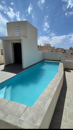 Apartment with a rooftop pool