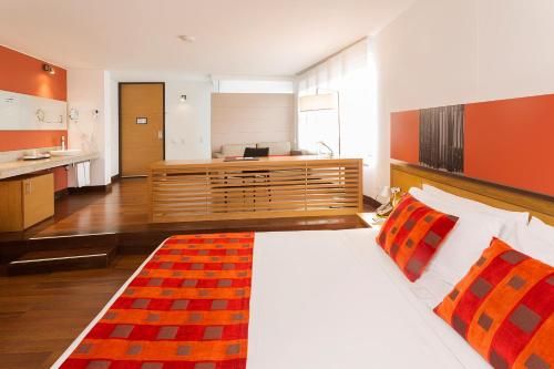 Postel nebo postele na pokoji v ubytování Hotel bh La Quinta
