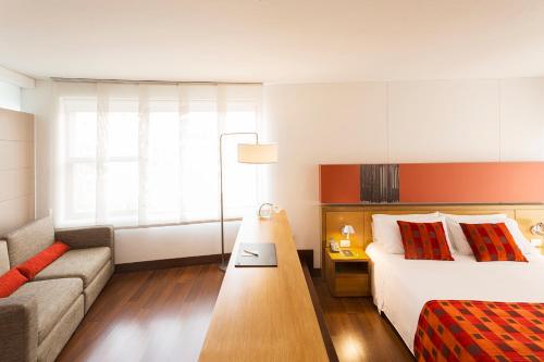 Postel nebo postele na pokoji v ubytování Hotel bh La Quinta