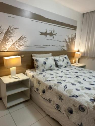 Katil atau katil-katil dalam bilik di Iloa Flat resort Apt 202 bloco i