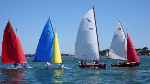 a group of sailboats in the water at Le Petit Hôtel des Hortensias in La Trinité-sur-Mer