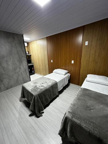 Katil atau katil-katil dalam bilik di Loft Lux 8 Próximo a Igreja Matriz