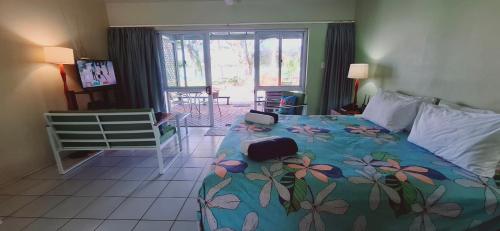 Katil atau katil-katil dalam bilik di Avana Waterfront Apartments