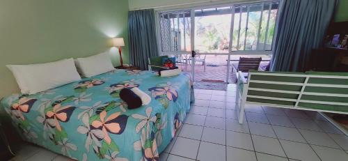 Katil atau katil-katil dalam bilik di Avana Waterfront Apartments