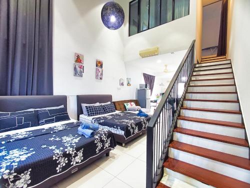 Ένα ή περισσότερα κρεβάτια σε δωμάτιο στο AZ Suites 2 @Cyberjaya Putrajaya