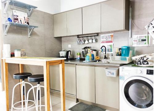 Η κουζίνα ή μικρή κουζίνα στο AZ Suites 2 @Cyberjaya Putrajaya
