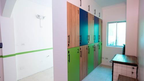 a row of lockers in a room at Community Hostel Quito in Quito