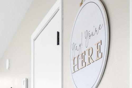 a mirror with a sign that reads what you want to see at Modern Comfort Retreat in Branson