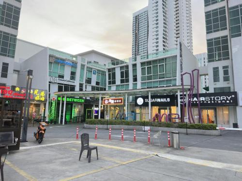 an empty parking lot in a city with buildings at Amazing Seaview Duplex George Town Maritime Suites 20 in George Town