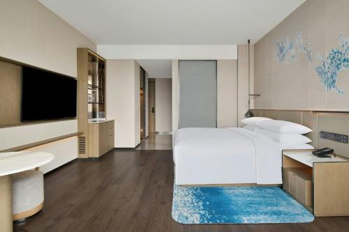 TV a/nebo společenská místnost v ubytování Courtyard by Marriott Nantong