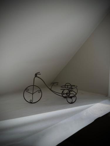 a black bike sitting on a shelf in a room at Downtown Huntsville Gem in Muskoka in Huntsville