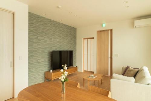 TV a/nebo společenská místnost v ubytování -Mova Villa Koshi Daiwa 4-近阿蘇 熊本城 各類溫泉 台積電 合志獨棟民宿 體驗當地生活