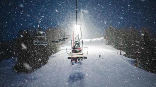 a ski lift going down a snow covered slope at Holiday Inn Express - Sault Ste. Marie by IHG in Sault Ste. Marie