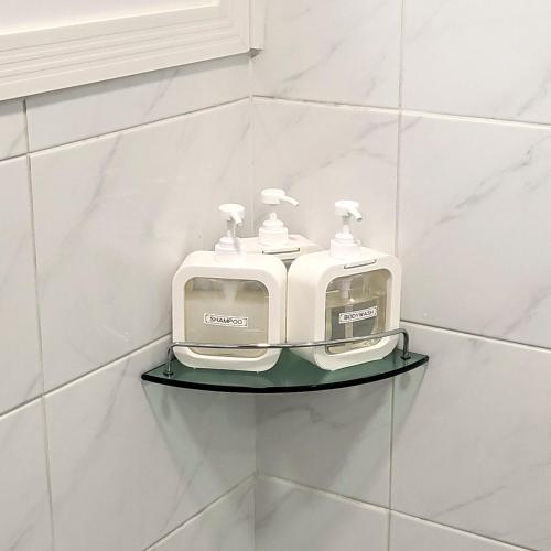 a toaster sitting on a shelf on a wall at Humming stay in Seoul