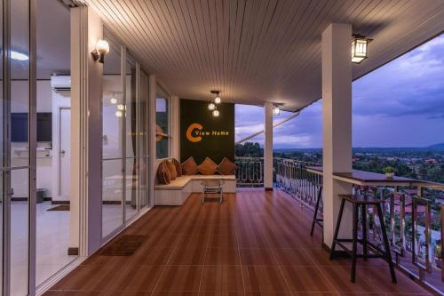 a balcony of a building with a view of the city at C View Home in Nan