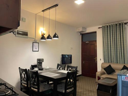 TV a/nebo společenská místnost v ubytování Breeze Holiday Apartment