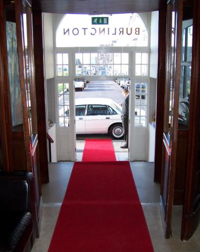 a car is parked in the door of a hotel at The Burlington in Worthing