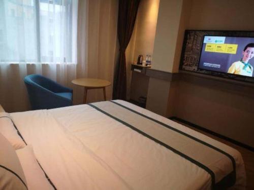 Μια τηλεόραση ή/και κέντρο ψυχαγωγίας στο City Comfort Inn Mianyang Southwest University Of Science And Technology