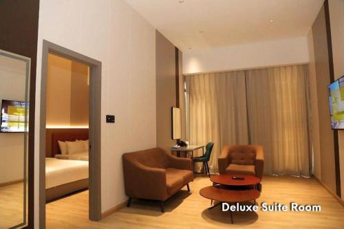 Кровать или кровати в номере J HOTEL