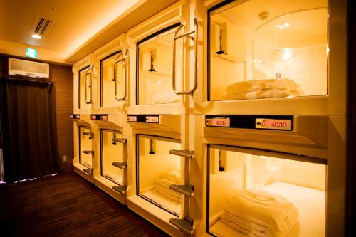 Fotografie z fotogalerie ubytování Capsule Inn Osaka (Male Only) v Osace