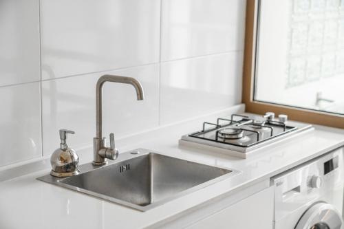 Kuchyň nebo kuchyňský kout v ubytování Hotel Mireosi
