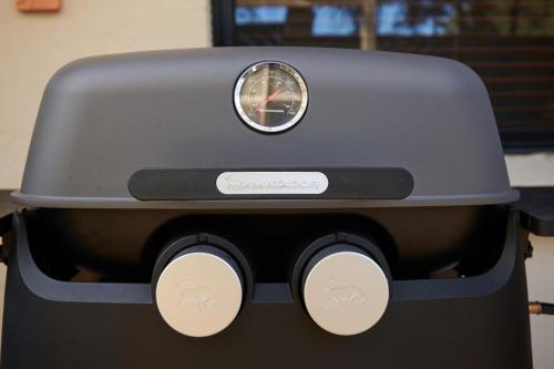 a toaster is sitting on top of a table at Kingfisher Apartment in Hallidays Point