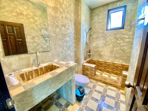 Koupelna v ubytování Phuphan Resort