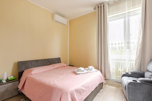 Postel nebo postele na pokoji v ubytování Stanza Dima