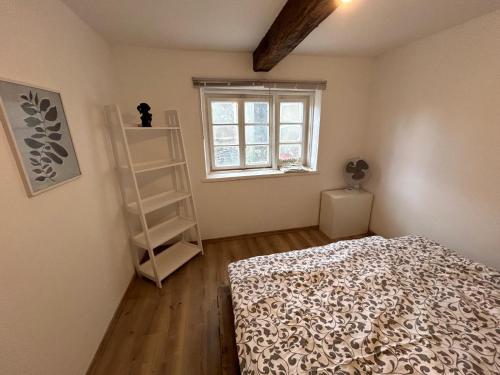 Ένα ή περισσότερα κρεβάτια σε δωμάτιο στο Natururlaub mit Pferdeglück - dein Rückzugsort bei Nikopol