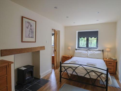 Voodi või voodid majutusasutuse Yard Cottage toas