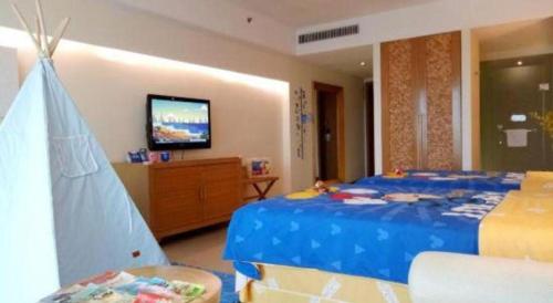 TV a/nebo společenská místnost v ubytování Man Wan Harmona Resort