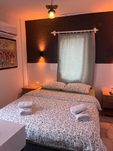 Postel nebo postele na pokoji v ubytování Kılavuz otel