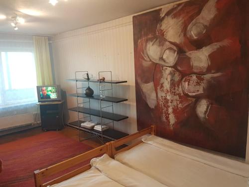 Кровать или кровати в номере Apartament Erfolg 1