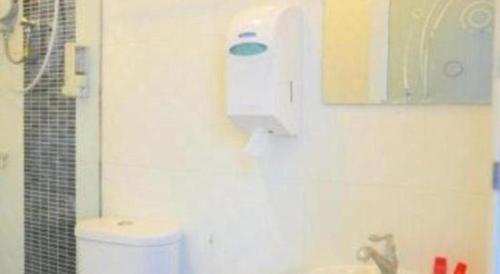 Ванная комната в OYO 89457 682 Lodge