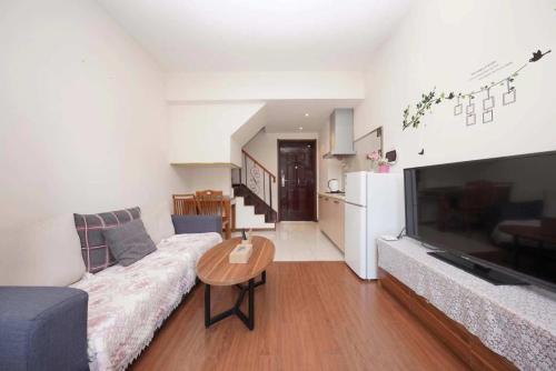 Ruang duduk di Dream Back Great Wall Boutique Villas in Beijing's Gubei Water Town