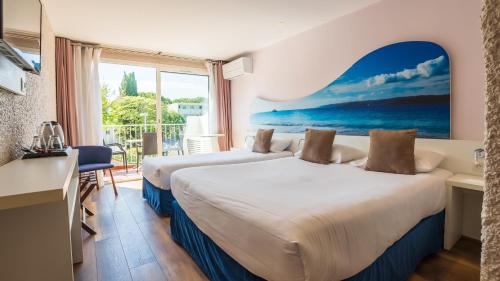 Кровать или кровати в номере Hotel Europe