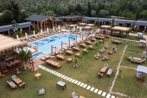 an aerial view of a resort with a swimming pool at Kekova Garden Village in Demre