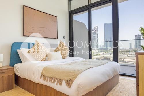 En eller flere senge i et værelse på Bloomfields Stylish 1br In Al Maryah Vista