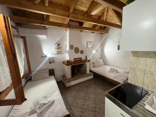 Ένα ή περισσότερα κρεβάτια σε δωμάτιο στο Aliki Stone House