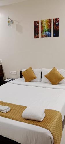 Un ou plusieurs lits dans un hébergement de l'établissement La Sea Vue Goa