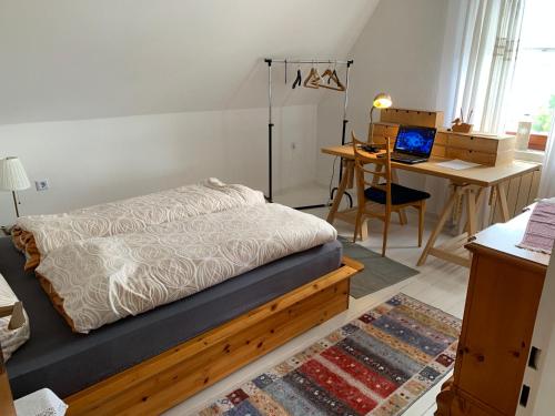 Postel nebo postele na pokoji v ubytování Ferienwohnung Hügel